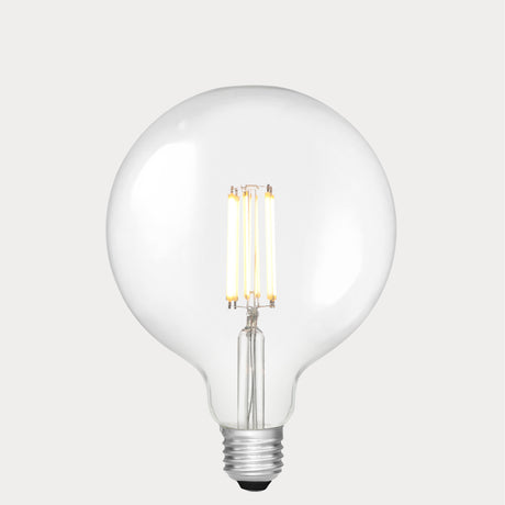 Dulora 11W E27 LED globe bulb in clear glass, glowing with 3000K soft white light.
