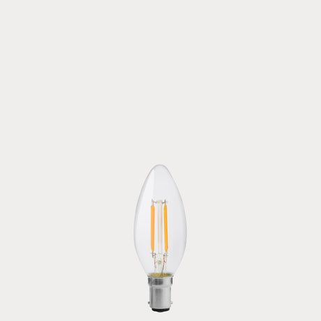 Dulora 4W B15 LED candle bulb in clear glass, shown unlit.