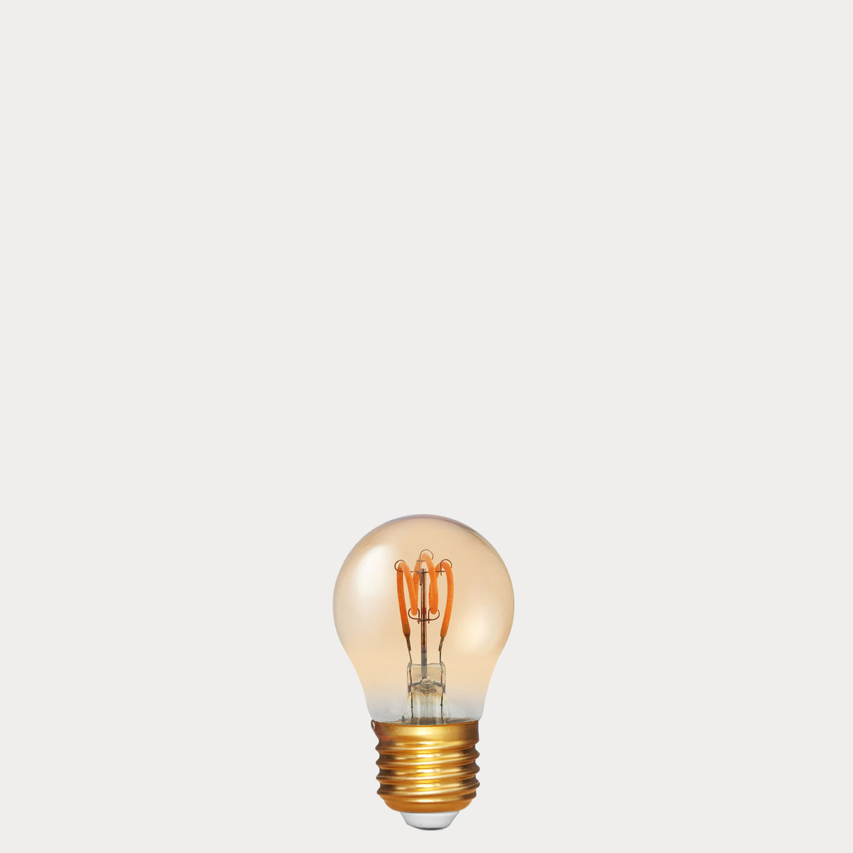 Dulora 4W Vintage Fancy Round LED Bulb E27 in Ultra Warm White with spiral filament visible through amber tinted glass