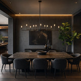 Dulora C35 Clear Candle LED Bulbs illuminating a modern matte black chandelier in a luxury dining room setting